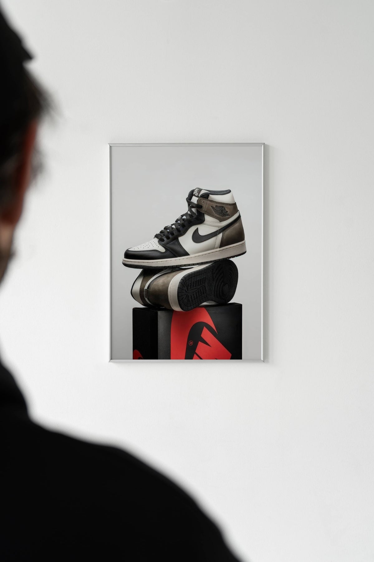 Framed poster print on white wall - poster prints vs canvas vs metal wall art comparison guide