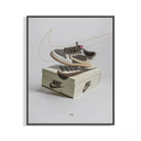 Mocha Air Jordan 1 Travis Scott print floating above a Nike shoebox with reversed brown swoosh detail