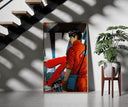 Red Akira Kaneda Jacket framed print on a staircase entryway wall beside a plant