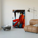 Red Akira Kaneda Jacket poster framed above a tan leather living-room couch