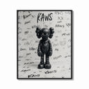 Framed Black KAWS Companion figure standing print shown as a bold statement piece on a clean gallery wall