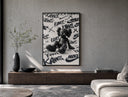 Black KAWS Companion figure sitting poster framed above a wood console in a concrete-wall living room
