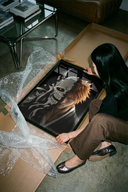 The Orange-haired man with cracked skull mask poster shown across its range of print sizes