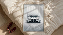 BMW M3 GT Race framed print styled on a bed with sneakers alongside