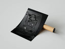 Dark queen of hearts playing card poster displayed with a cardboard shipping tube