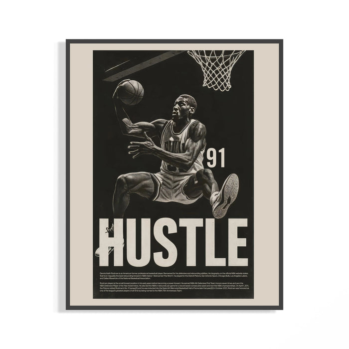 Black framed Dennis Rodman hustle print in monochrome showing basketball action on a wall