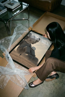 The Giant KAWS Companion sculpture in desert poster shown across its range of print sizes