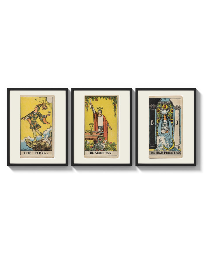 Three 1909 tarot cards three-panel set arranged as a triptych on a bright gallery wall