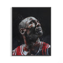 Michael Jordan portrait print in a red Bulls jersey looking upward with bold paint effects on the wall