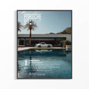 Framed Porsche 911 Poolside Legend poster with white 911 beside blue pool, palm tree, and mountain backdrop
