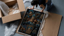 Blue-haired muscular anime cyborg man framed print being unpacked from protective bubble wrap and a box
