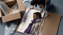 Anime marine admiral profile portrait framed print being unpacked from protective bubble wrap and a box
