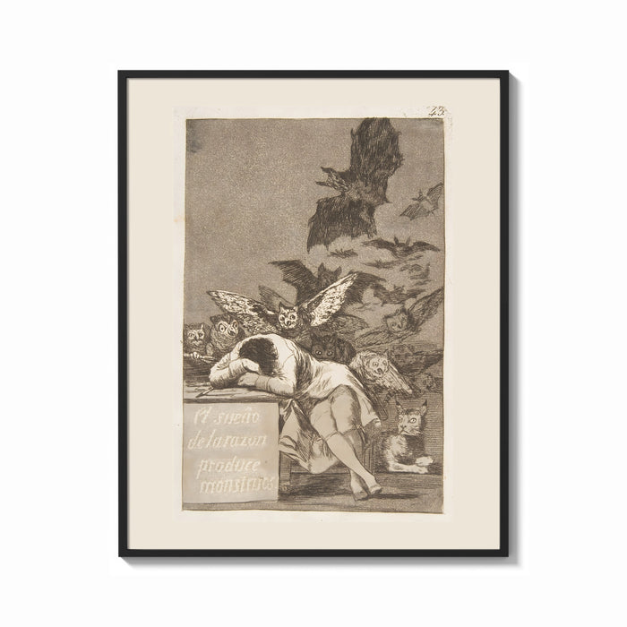 Framed Sleeping man surrounded by owls and bats print shown as a bold statement piece on a clean gallery wall