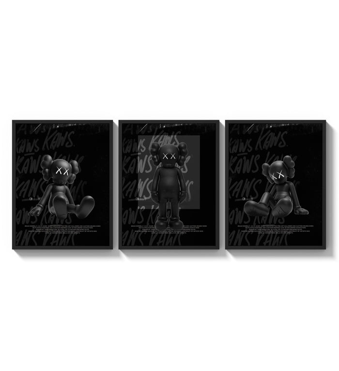 Black KAWS Companion framed poster set of 3 three-panel set arranged as a triptych on a bright gallery wall