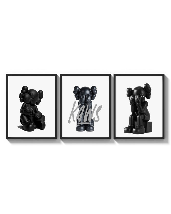 Blackout XX KAWS Hypebeast Wall Art Set of 3 arranged on a bright gallery wall