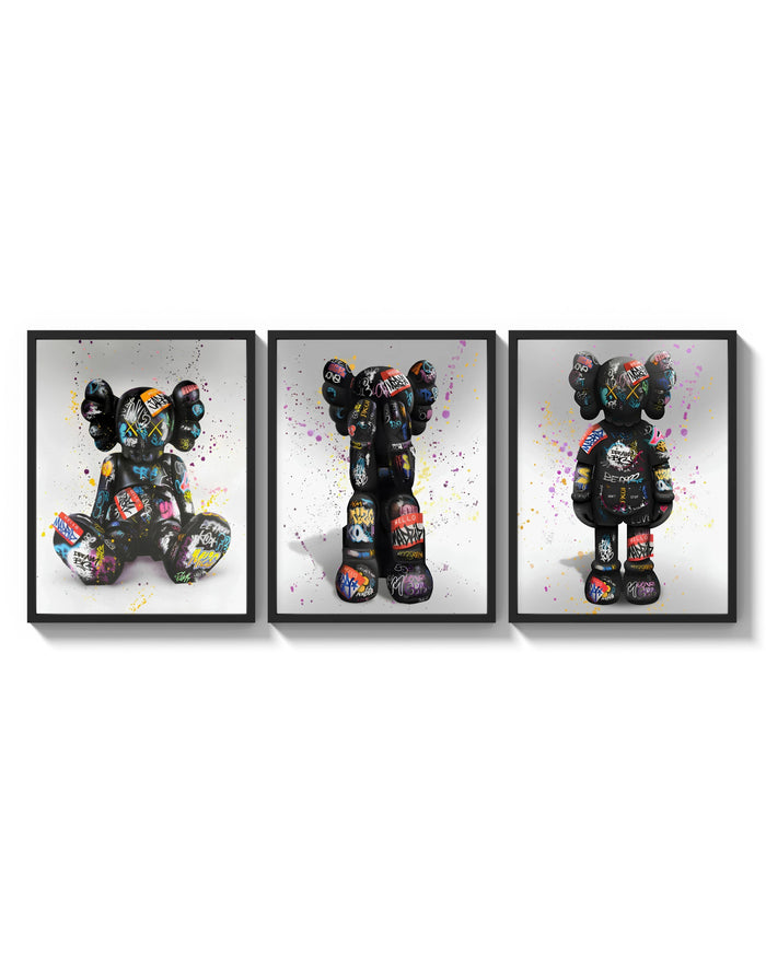 KAWS Companion Graffiti Triptych arranged on a bright gallery wall