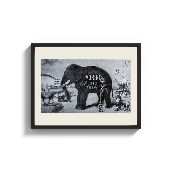 Framed Large elephant with tusks print shown as a wide statement piece on a clean white wall