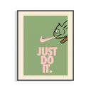 Framed chameleon poster in black frame, pink Nike swoosh over sage green with Just Do It text