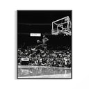 Michael Jordan in midair performing a free throw line slam dunk in dramatic black and white poster photography