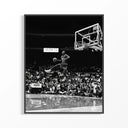 Michael Jordan Free Throw Line Dunk poster print in black frame showing iconic midair slam dunk in dramatic black and white photography