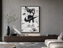 KAWS figure wearing Air Jordan sneakers poster framed above a wood console in a concrete-wall living room