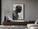 Michael Jordan screaming portrait poster framed above a wood console in a concrete-wall living room