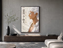 White-haired smiling anime man profile poster framed above a wood console in a concrete-wall living room