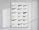 Various hand-drawn Nike swoosh logos poster in a slim frame on a bright wall with soft window light