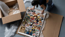 One Piece Straw Hat Crew characters framed print being unpacked from protective bubble wrap and a box