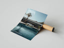 Porsche 911 poolside print partially unrolled from cardboard shipping tube on gray surface at an angle