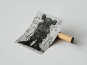Rolled poster of a black KAWS figure in Nike bomber jacket with grey graffiti backdrop and cardboard tube
