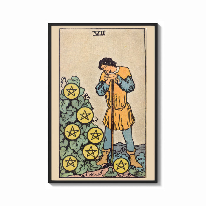 Framed Seven of Pentacles print shown as a bold statement piece on a clean gallery wall