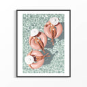 Aerial view of three women on pink pool floats in turquoise water – summer pool wall art print