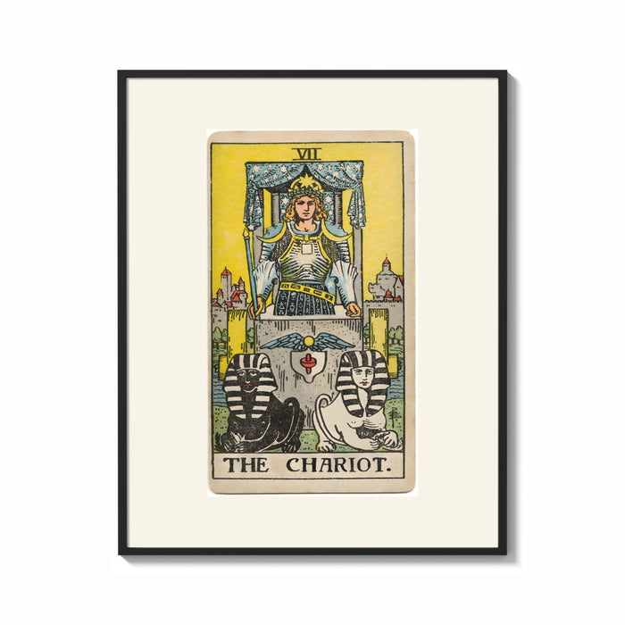 Framed The Chariot tarot card figure print shown as a bold statement piece on a clean gallery wall