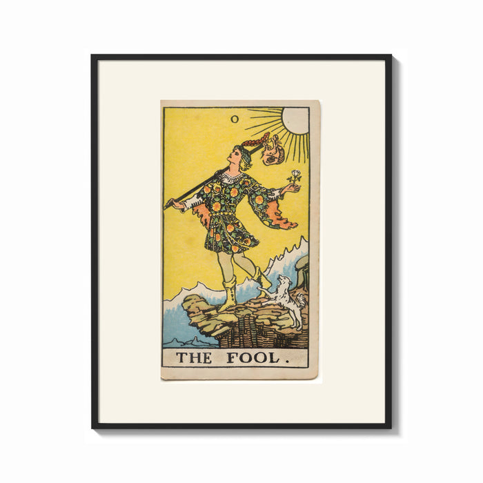 Framed The Fool tarot card figure print shown as a bold statement piece on a clean gallery wall
