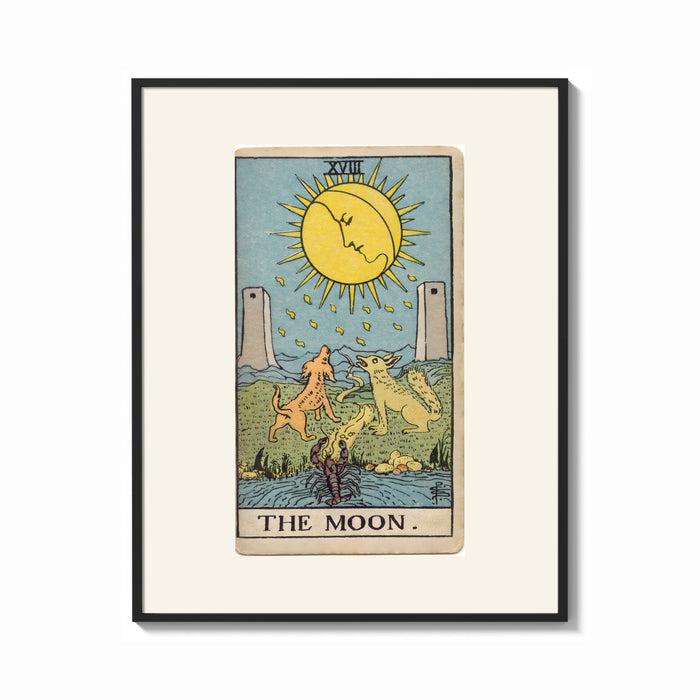 Framed The Moon tarot card print shown as a bold statement piece on a clean gallery wall