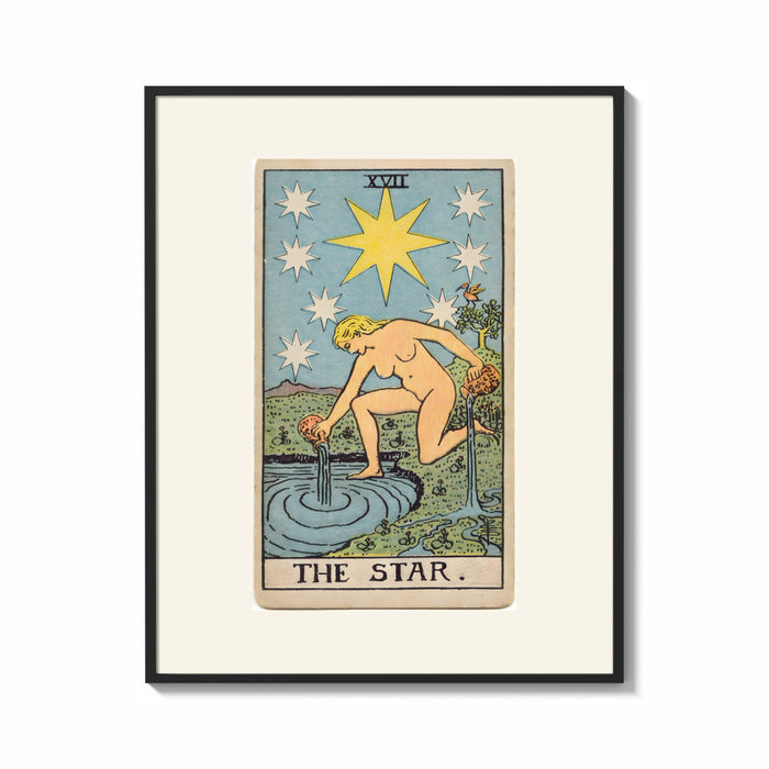 Framed The Star tarot card figure print shown as a bold statement piece on a clean gallery wall