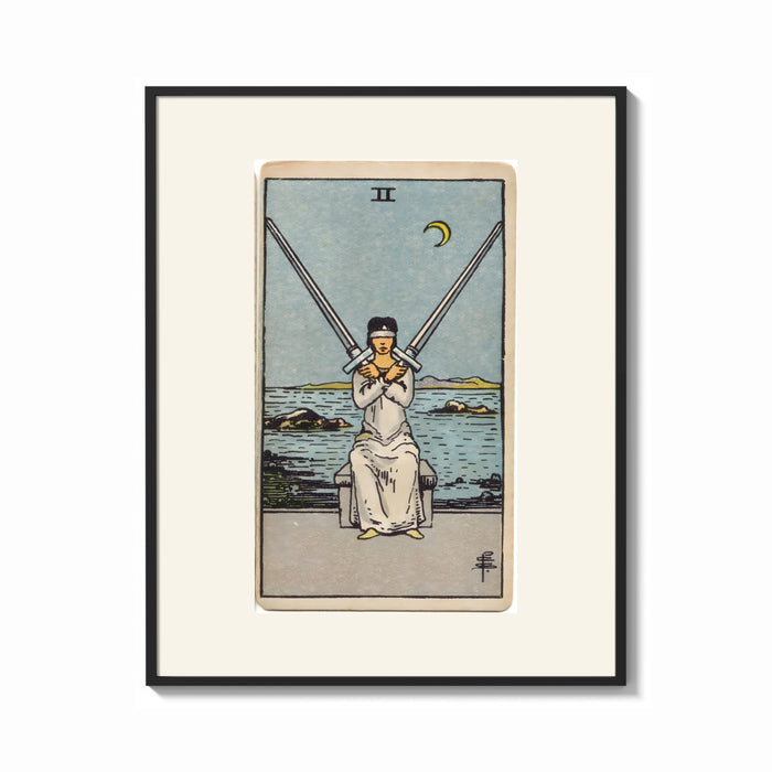 Framed Blindfolded woman holding two crossed swords print shown as a bold statement piece on a clean gallery wall