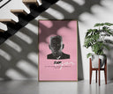 Tyler the Creator IGOR framed print on a staircase entryway wall beside a plant