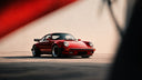 red porsche 911 with matte black rims
