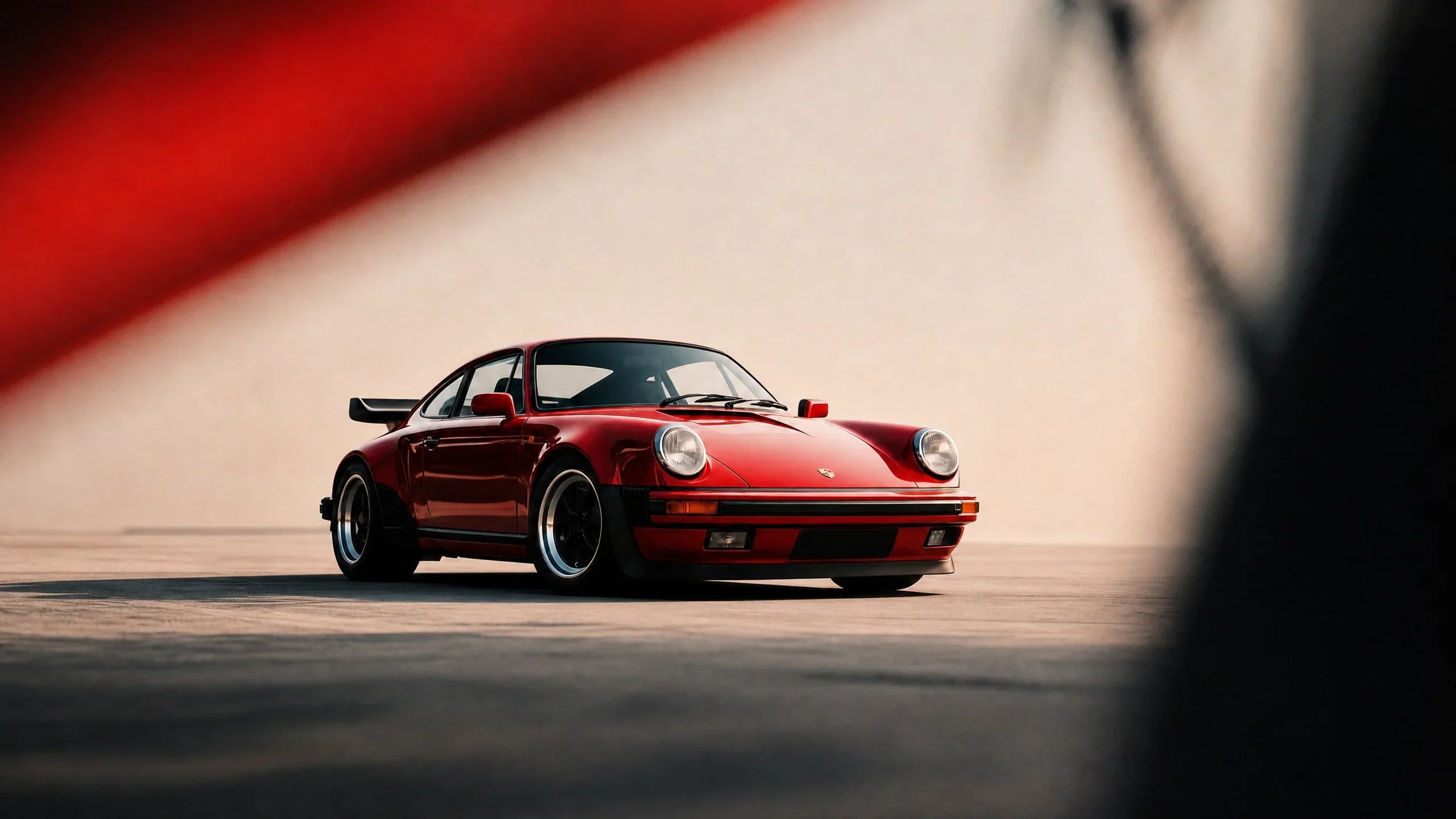 red porsche 911 with matte black rims