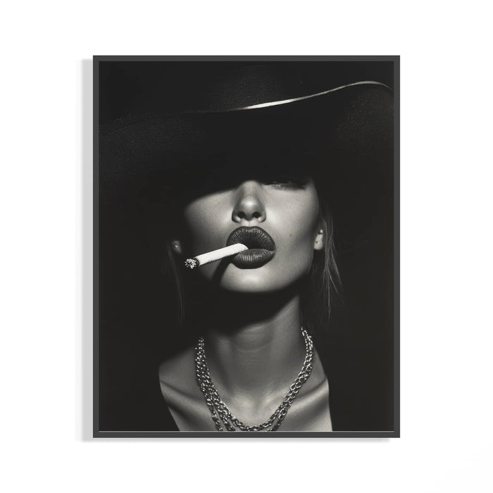 Black and white 90s supermodel portrait with wide-brimmed hat and cigarette in dark frame on a wall