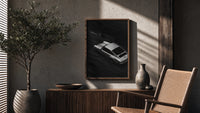 Silver Porsche 911 parked in alley poster framed above a fluted sideboard beside an olive tree