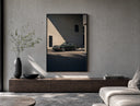 Vintage green Porsche 911 coupe poster framed above a wood console in a concrete-wall living room