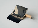 Rolled Vintage green Porsche 911 coupe poster beside its crush-resistant kraft shipping tube
