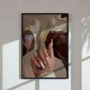 Artistic representation of hands with ornate nails and rings, complemented by sneaker attire.