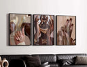 Abstract Black Woman Art Set of 9 featuring vibrant Afrocentric digital wall art above a modern living room sofa by Haus of Prints.