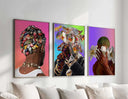 Abstract wall art depicting a figure holding flowers against a bold gradient background.