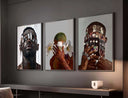 Abstract wall art showing a figure covering their face with flowers, capturing identity and cultural essence.