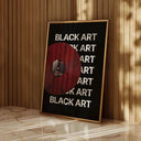 Black Art x The Strokes Vinyl Poster framed in gold, placed against a wooden backdrop, highlighting its bold design.